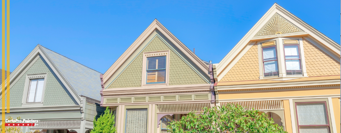 Homes with green, blue, and yellow exteriors