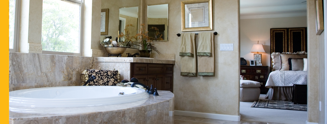 combined primary bedroom and bathroom after painting